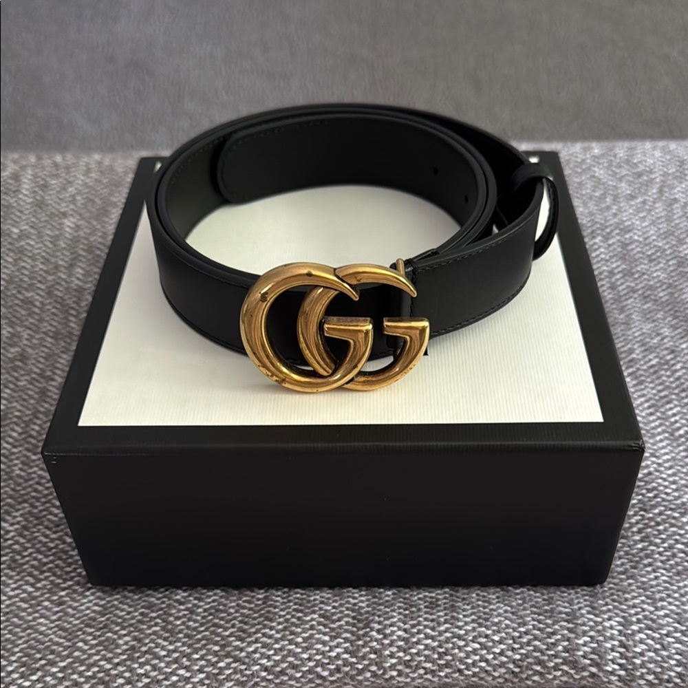 Gucci Black and Gold Belt with Signature Style